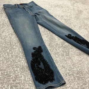 Five button Jean with embellishment on the bottom
